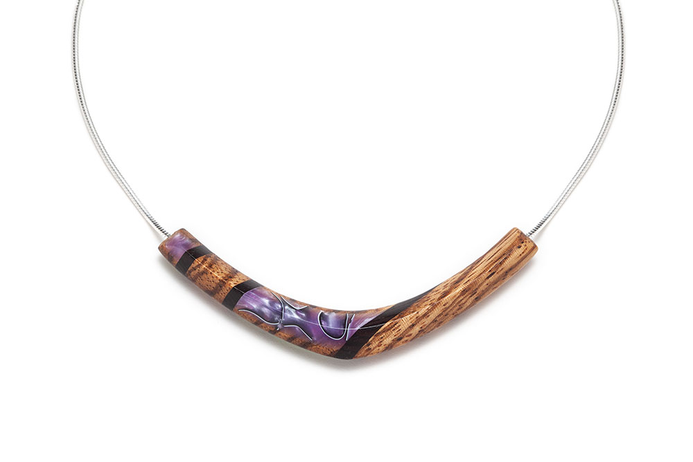 Purple wooden smile necklace with a silver chain